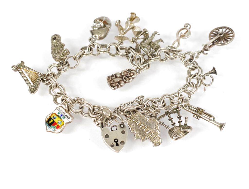 EIIR sterling silver charm bracelet - Barsby Auctions | Find Lots Online