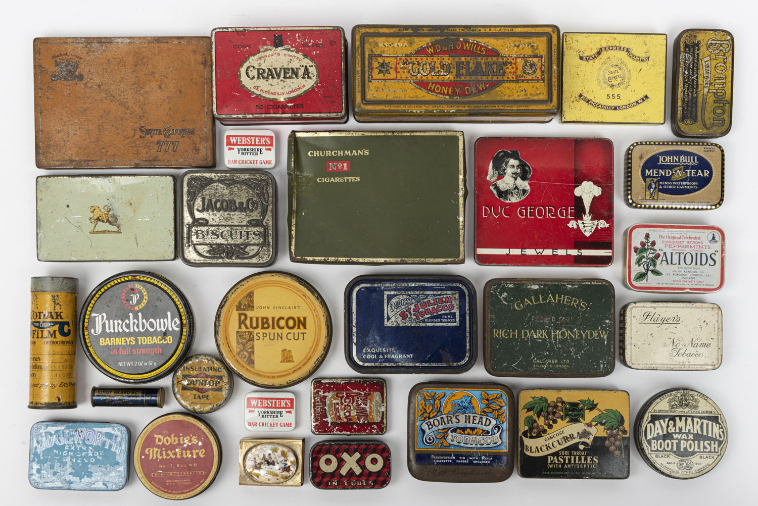 Twenty four assorted vintage and antique advertising tins, 19th and ...