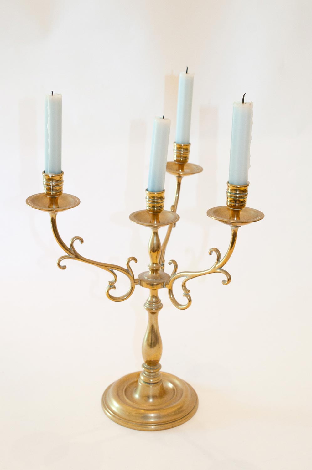 A brass four light candelabra - Mossgreen | Find Lots Online